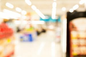 Supermarket or discount store blur background with bokeh