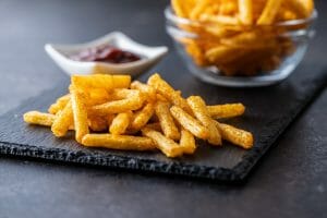 French fries. Salted snack. Potato chips.