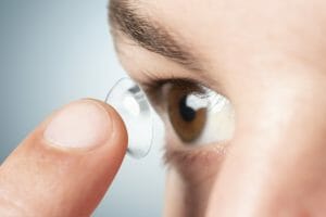 Wear contact lenses before applying makeup