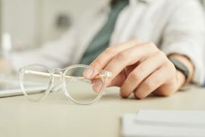 Businessman Holding Glasses Close Up